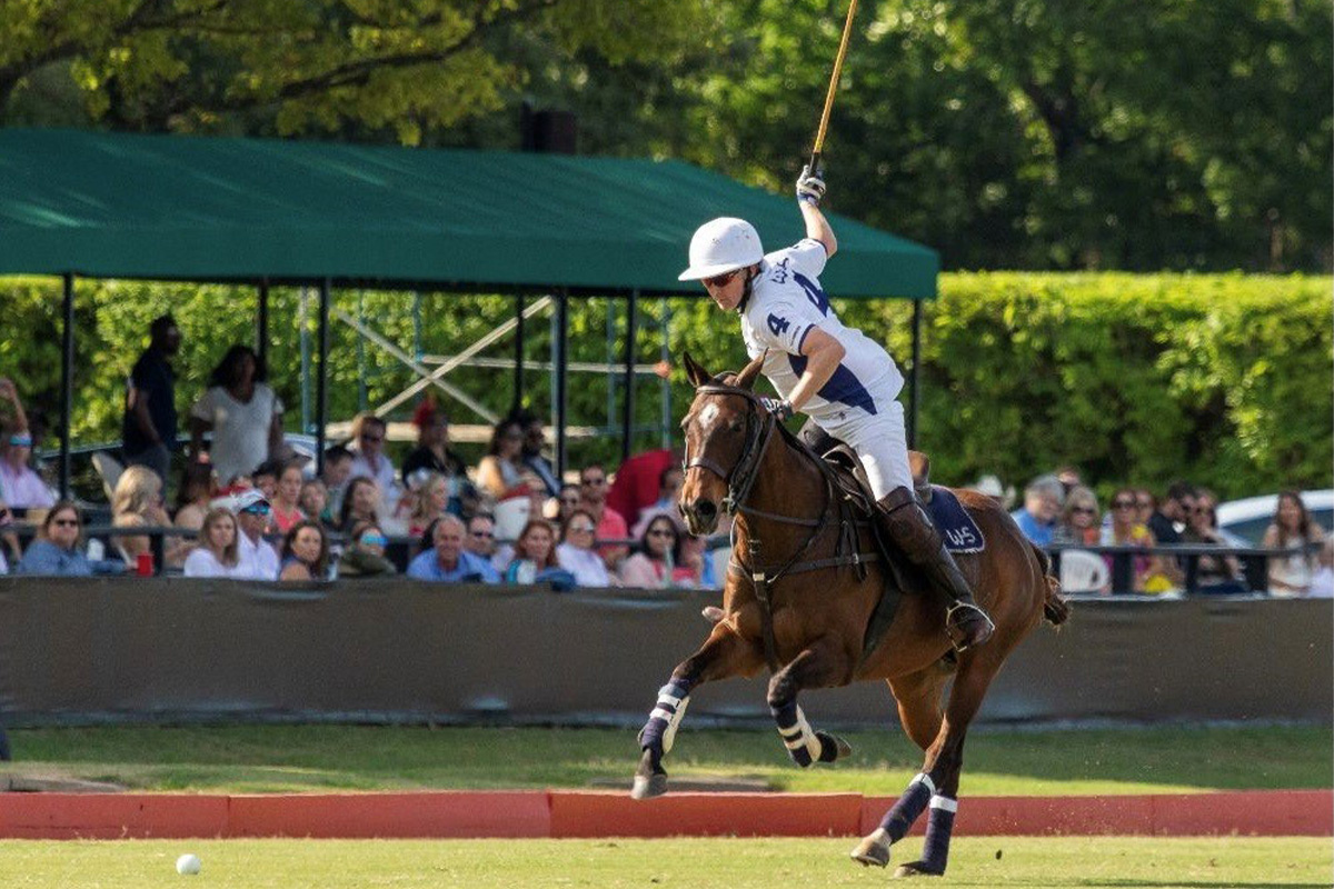 Sinor competing in a polo match